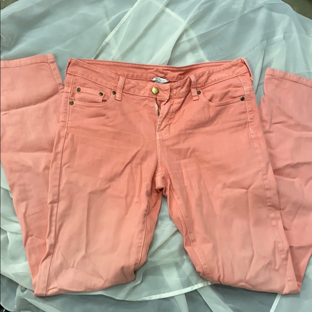 Salmon colored jeans